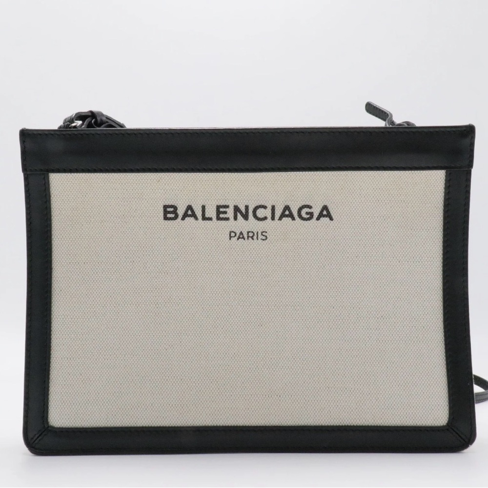 Balenciaga Navy and Cream canvas Crossbody Bag
Like new